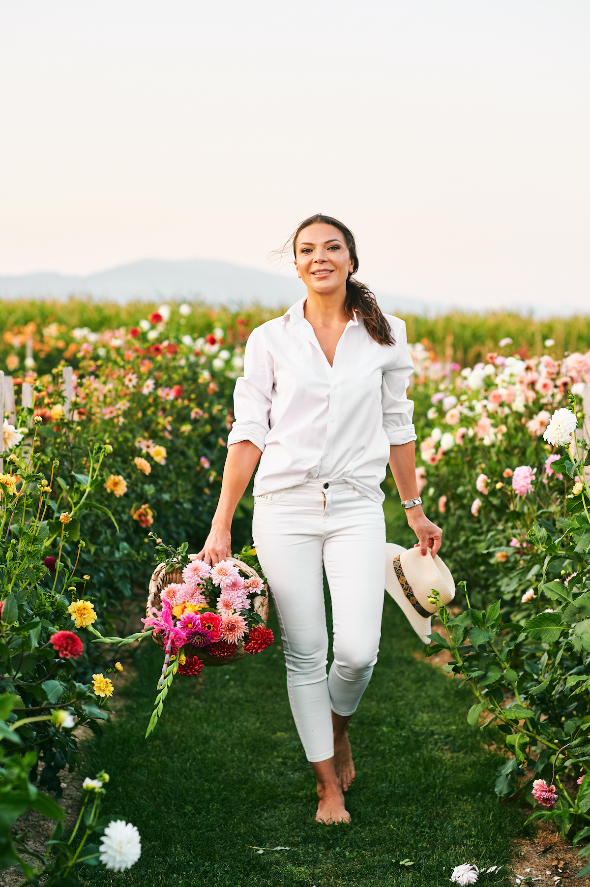 Woman tending a flower garden